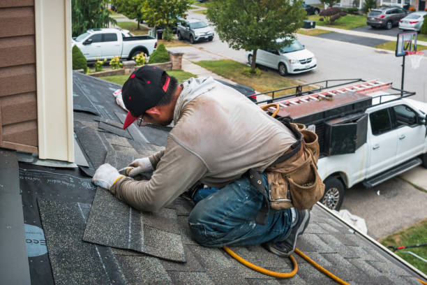 Professional Roofing technician working in Crabtree, OR